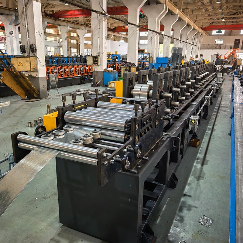 Estantería de almacenamiento de la caja del panel de fabricación de la máquina de acero de almacenamiento del sistema de estantería de la caja de la viga del rodillo que forma la línea 05